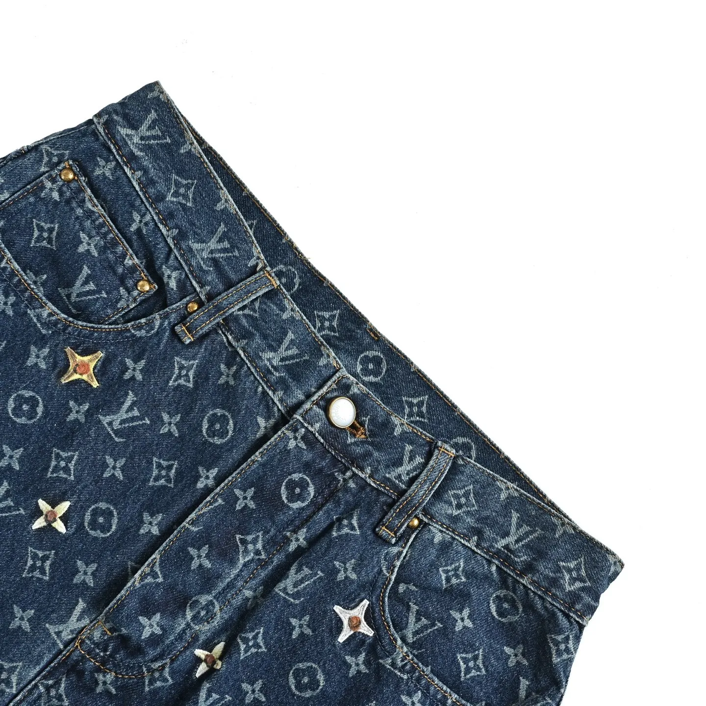 Louis Vuitton/Louis Vuitton all-over logo daisy embroidered jeans